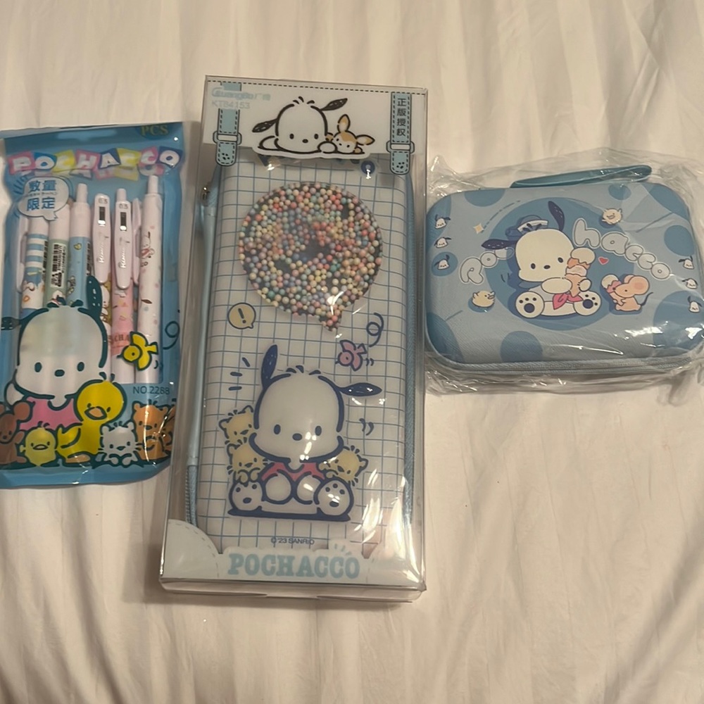 Pencil case, pens and a charger carrying case